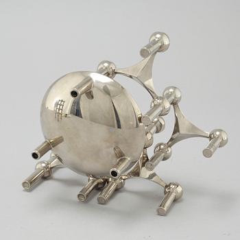 A metal candlestick with eleven parts by Ceasar Stoffi and Fritz Nagel, second half of the 20th century.