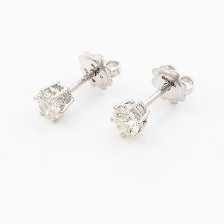 Earrings, single-stone earrings in 18K white gold with brilliant-cut diamonds.