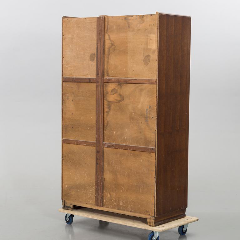 An English Lebus Furniture mens wardrobe around 1900.