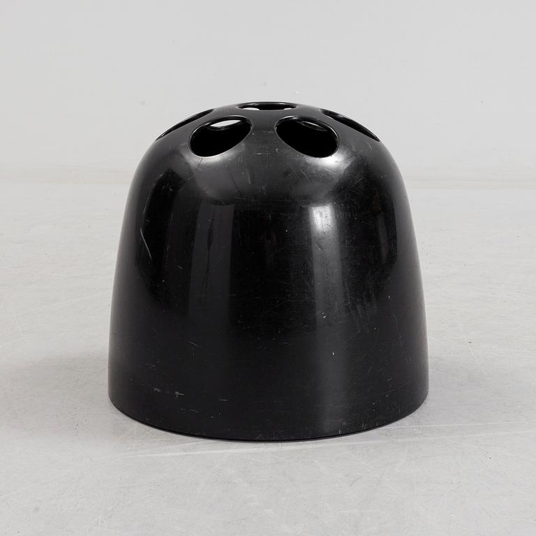 EMMA GISMONDI SCHWEINBERGER, a 'Dedalo' plastic umbrella stand from Artemide, Milan, Italy.