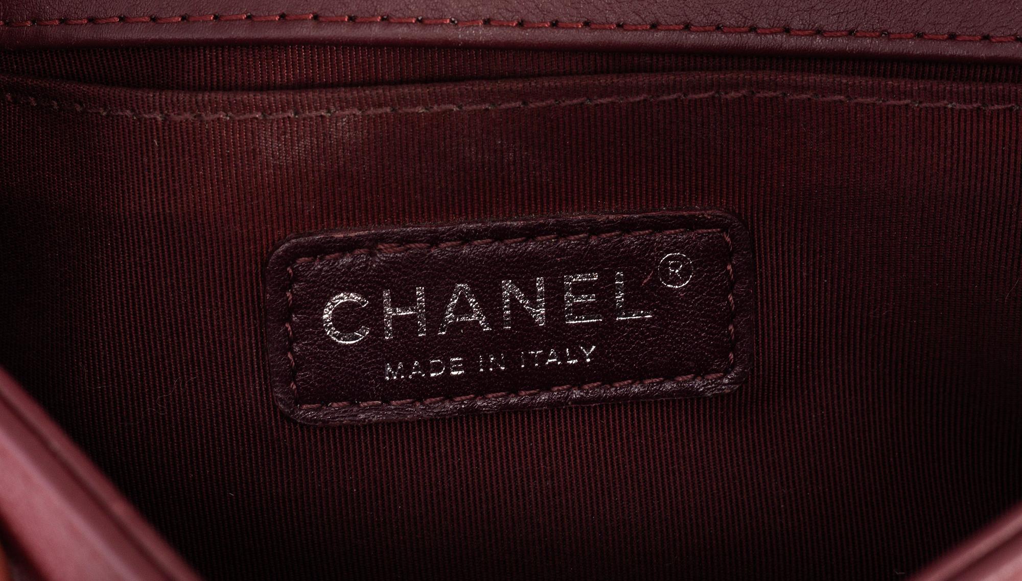 CHANEL, a burgundy quilted velvet 'Small Boy Bag'.