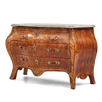 7. A rococo rosewood-veneered and ormolu-mounted commode by N. Korp (master 1763-1800).