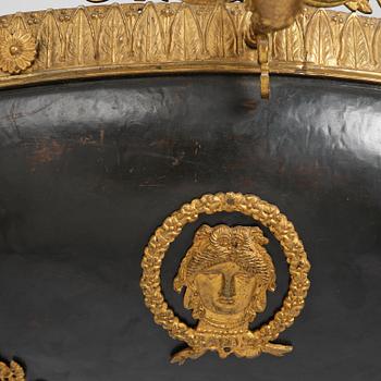A presumably Russian Empire gilt and patinated bronze nine-branch chandelier, 19th century.