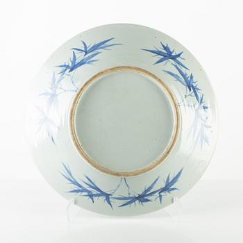 A blue and white Chinese dish, around 1900.