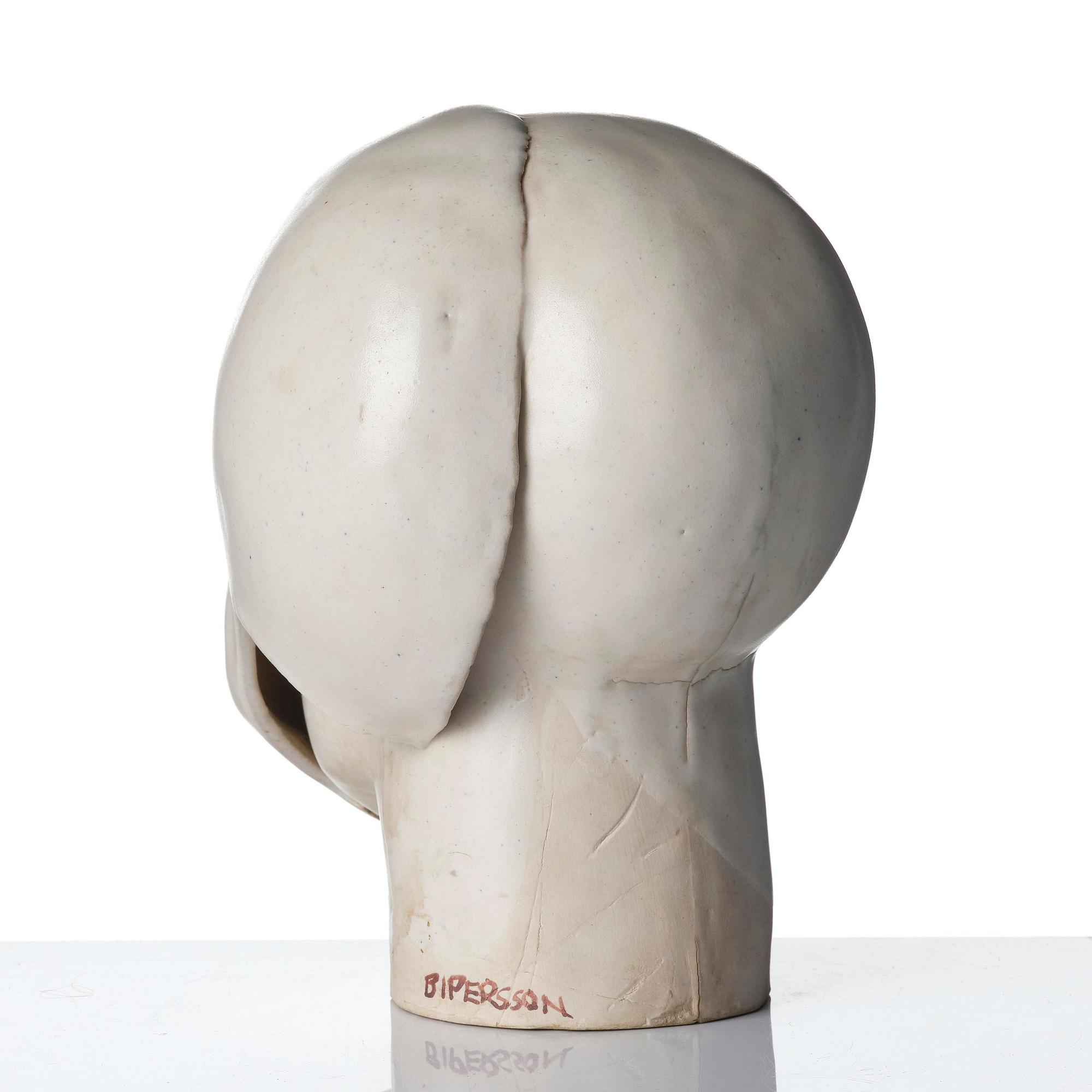 Britt-Ingrid "BIP" Persson, a glazed stoneware sculpture of faces, ca. 1970.