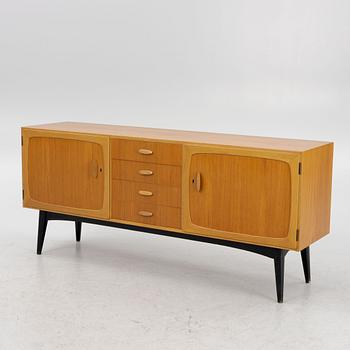 A Mid-20th Century Teak Sideboard.