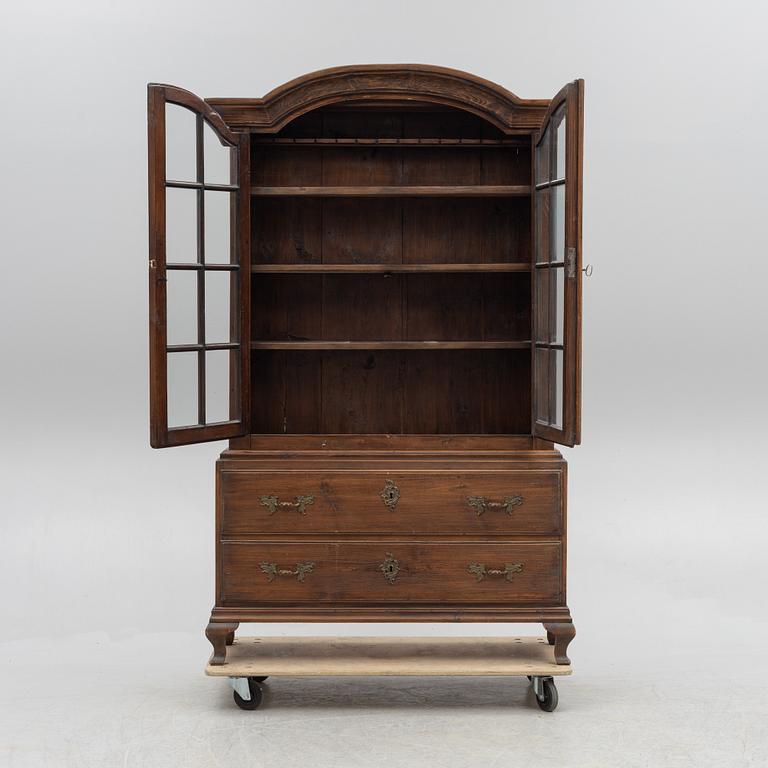 A display cabinet, 18th Century.