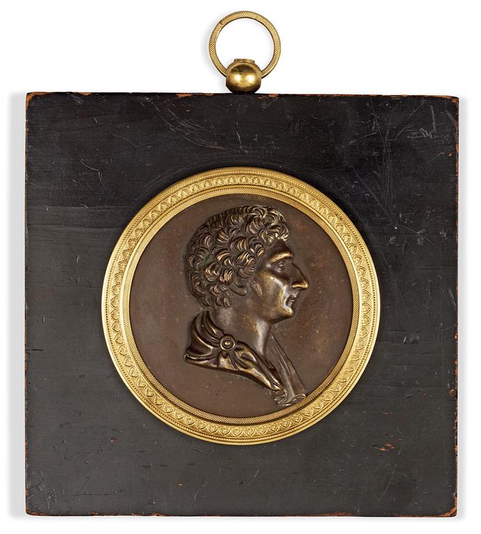 A Swedish Empire 19th century bronze portrait medallion representing Karl XIV Johan.