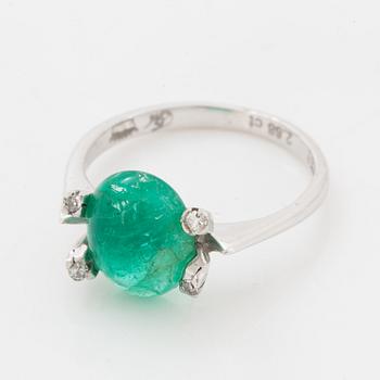 18K white gold cabochon emerald and diamond ring.