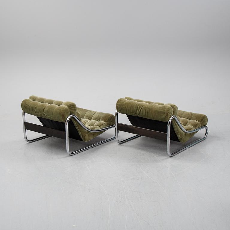 A pair of 'Impala' lounge chairs with table by Gillis Lundgren for IKEA, released 1972.