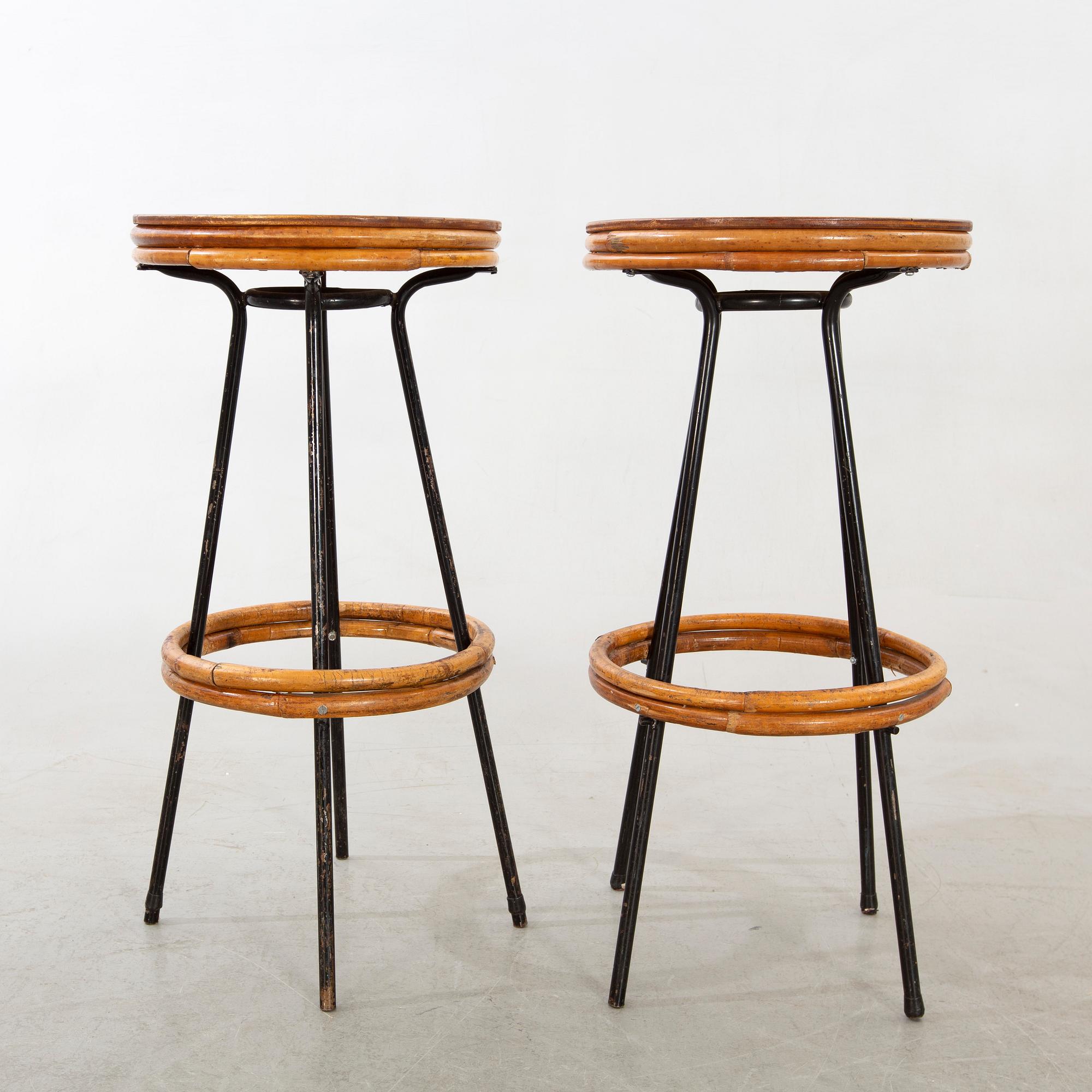 A set of four mid 20th century bar stools.