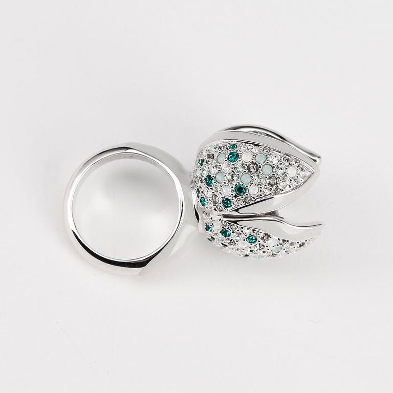 SWAROVSKI, a silver colored and lacquered ring with swarovski crystals.