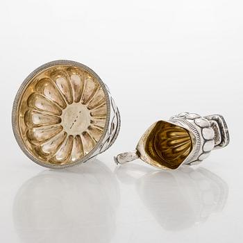 A silver cream jug by A.G. Illberg, Hamina, and a silver bonbonnière by Hj. Fagerroos, Helsingfors, 19th century.