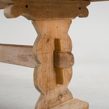 A 20th century pine table.