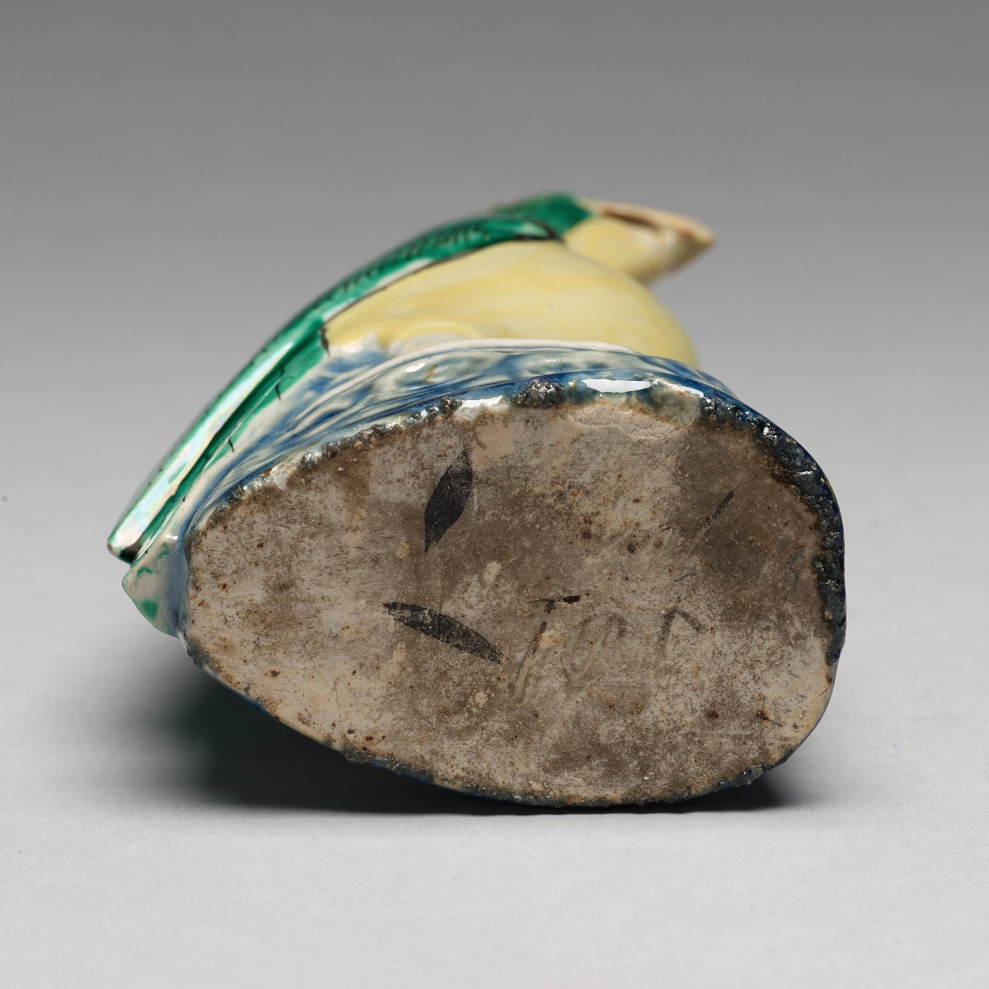 A pair of famille rose figures of parrots, late Qing dynasty.