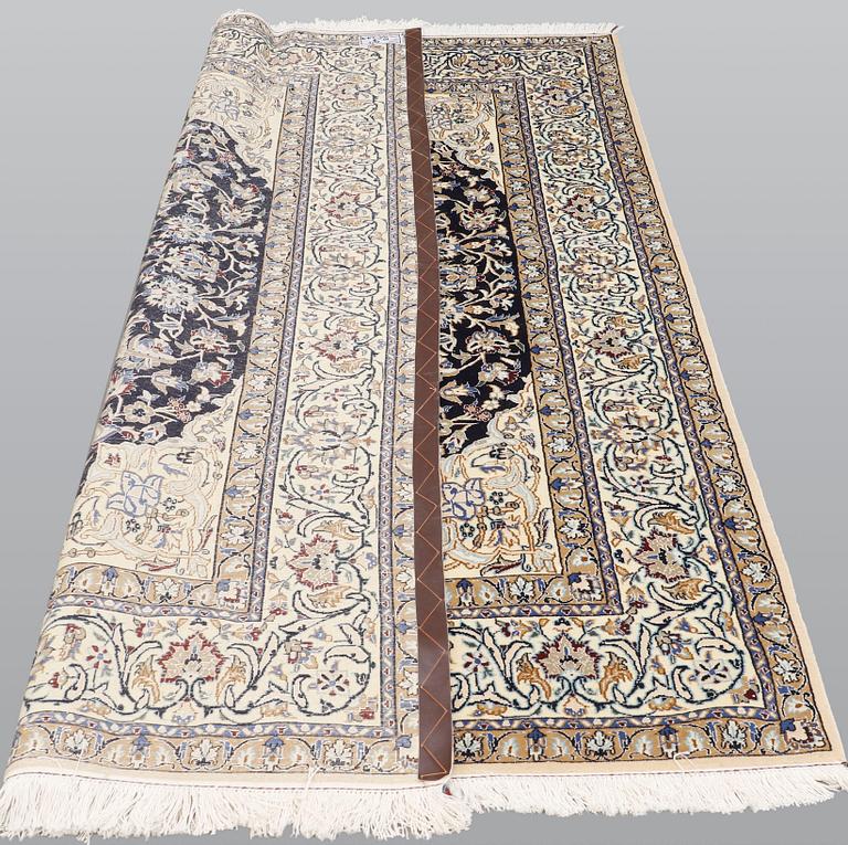 A carpet, Nain Part Silk, sk 9 LAA, ca 244 x 155 cm.