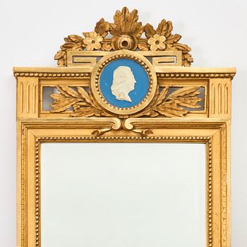 A Gustavian giltwoos mirror by J. Åkerblad (master in Stockholm 1758-99).