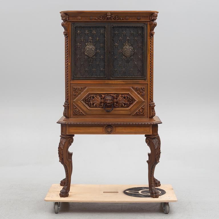 A Baroque style drinks cabinet, first half of the 20th Century.