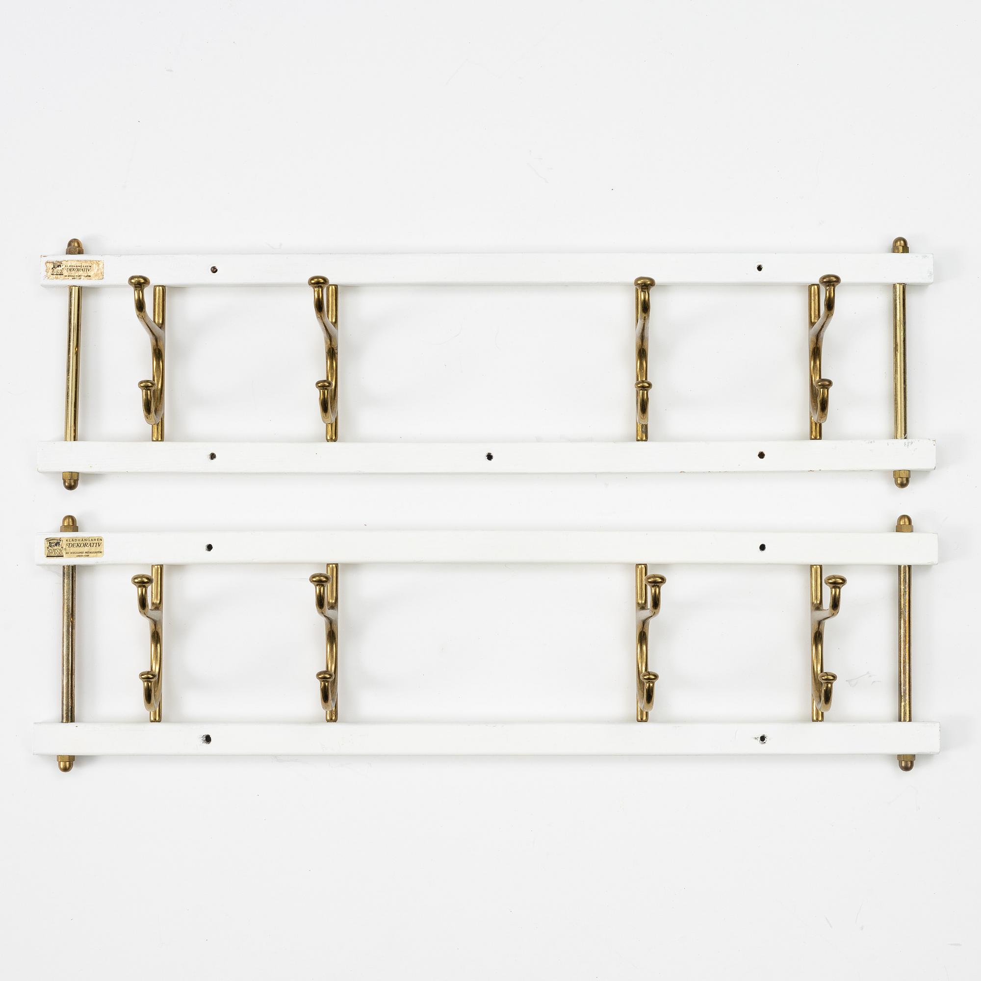 Klädhängare, ett par, "Dekorativ", Skoglunds metallgjuteri, Anderstorp, 1950-/60-tal.