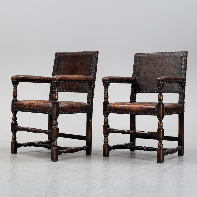 A pair of baroque style armchairs, first half of the 20th century.