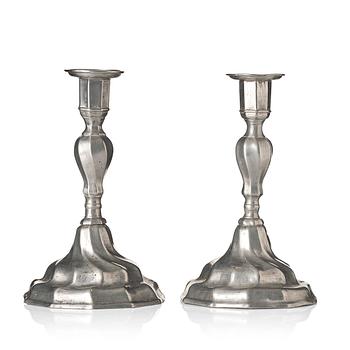 A pair of Rococo pewter candlesticks by G. Östling, Vimmerby (active 1762-90).