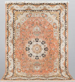 A part silk Tabriz carpet, so called 50 Raj, c 301 x 200 cm.