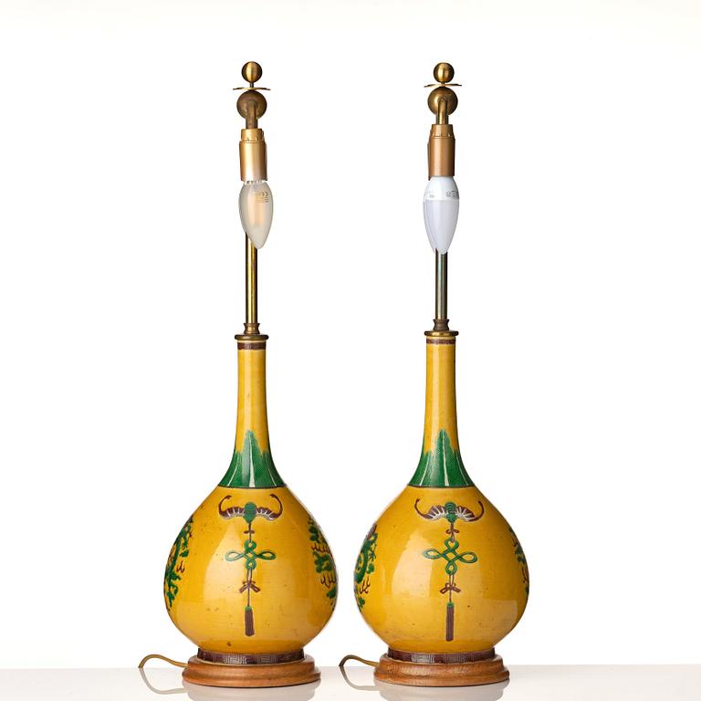 A pair of late yellow ground vases with five clawed dragons, late Qing dynasty.