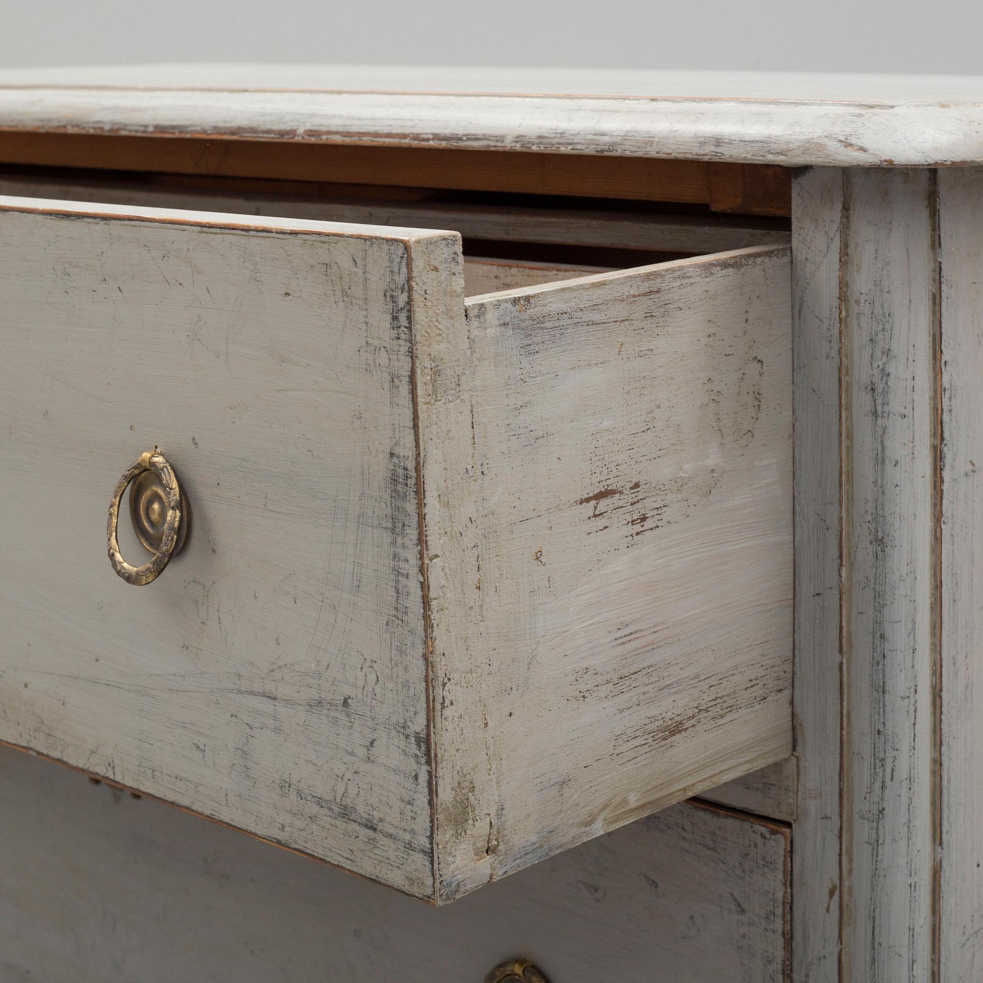 A mid 19th century painted chest of drawers.