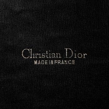 CHRISTIAN DIOR, set om tre väskor samt portmonnä.