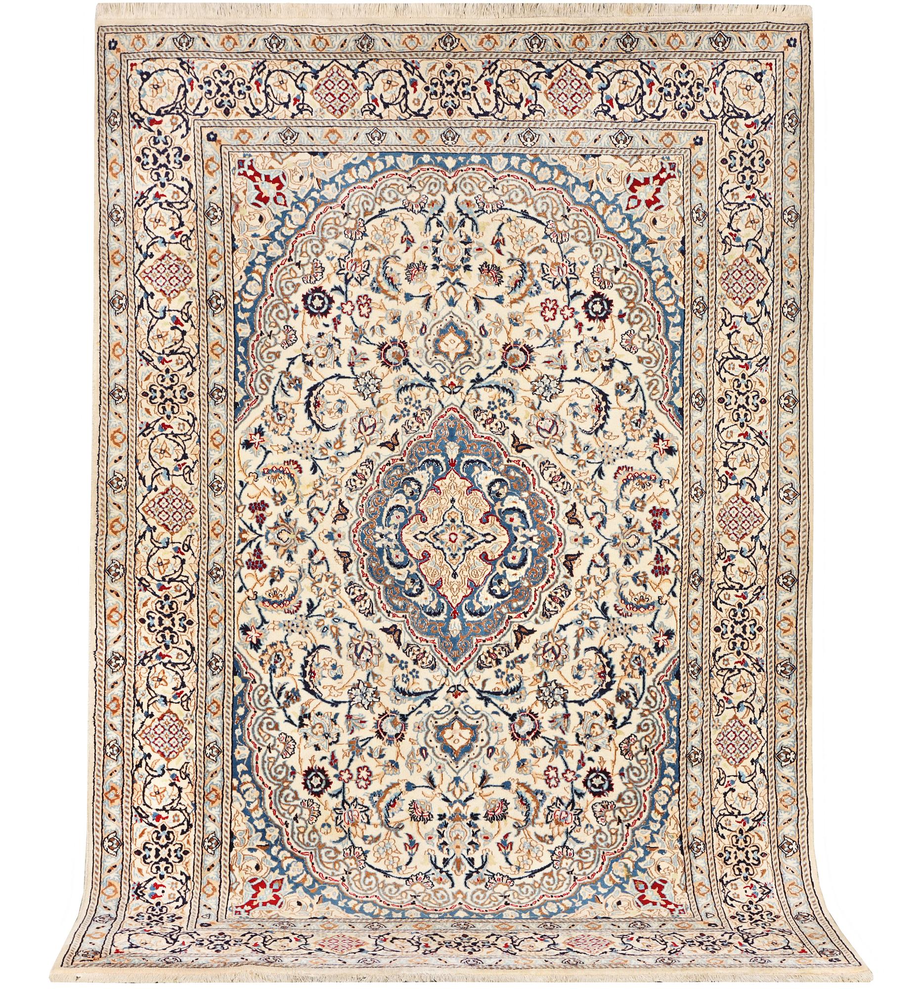 A Nain carpet, part silk, 9 laa, c. 300 x 195 cm.