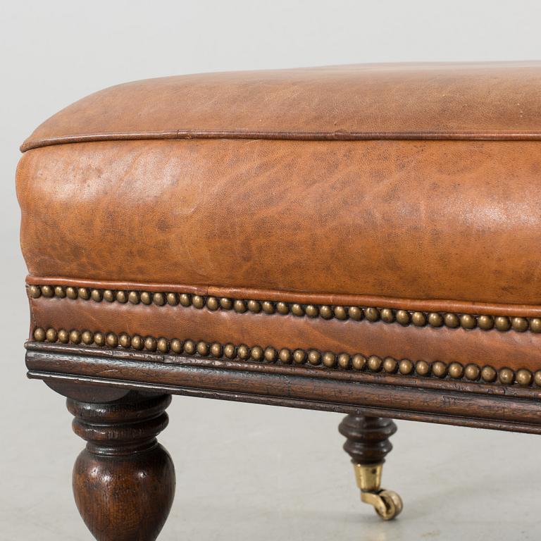 A CHESTERFIELD STYLE OTTOMAN, around year 2000.