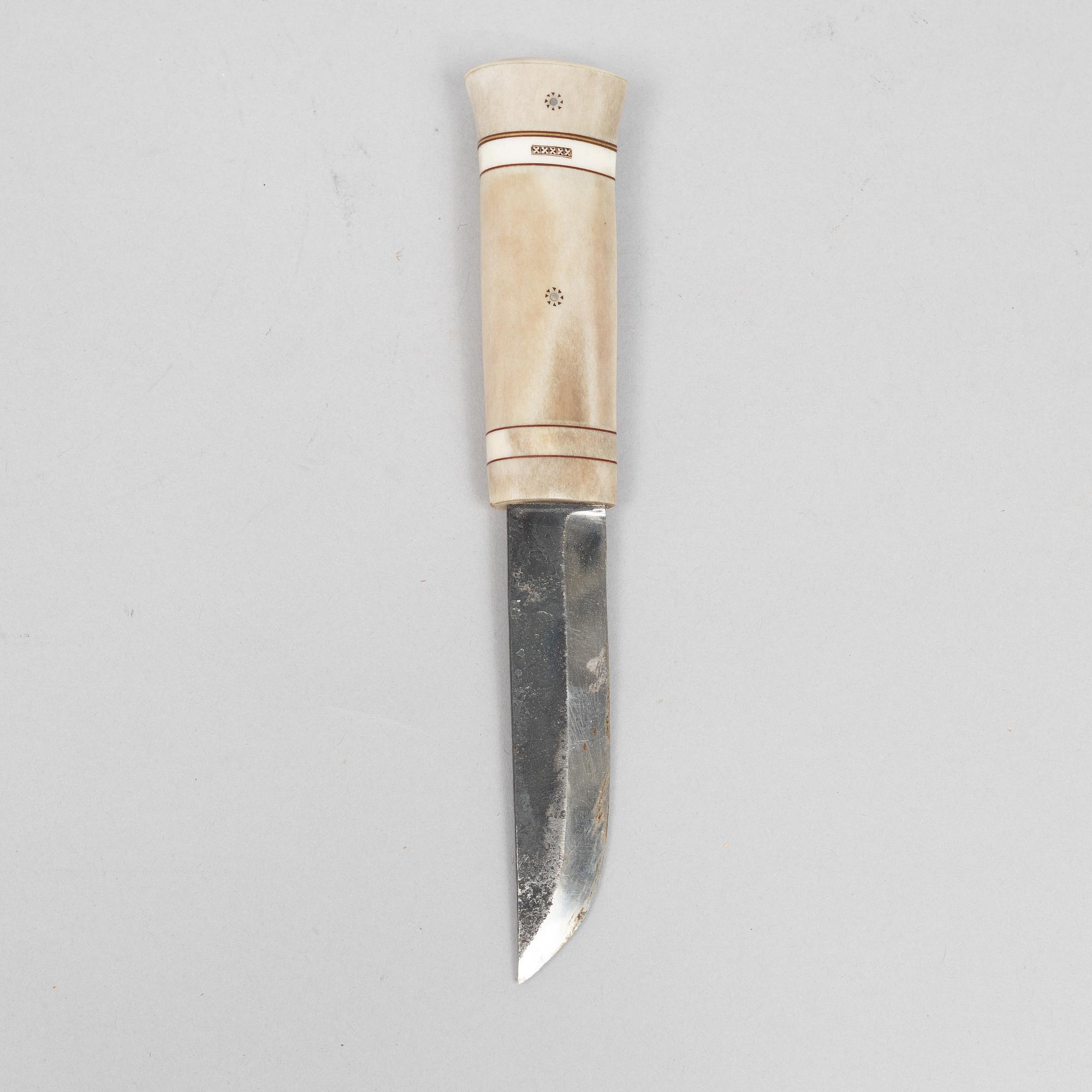 Ingvar Backlund, a reindeer horn knife, signed and dated 99-XX.