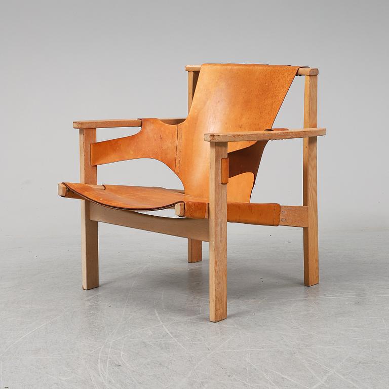 CARL-AXEL ACKING, an oak and leather 'Trienna' easy chair from Källemo.