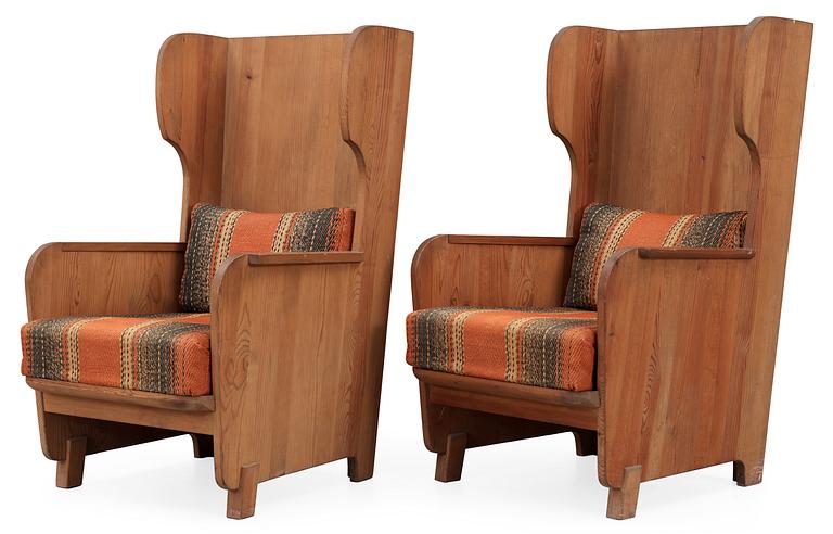 A pair of Axel-Einar Hjorth 'Lovö' pine armchairs by NK, 1930's.