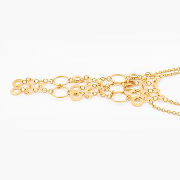 Siv Lagerström two necklaces in yellow metal.