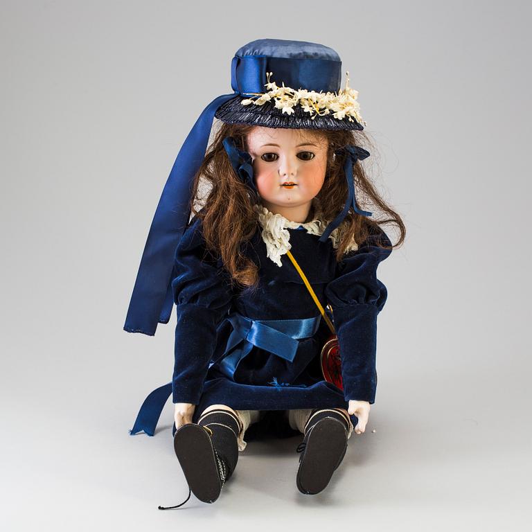 A bisque head doll, Germany, 1910s.