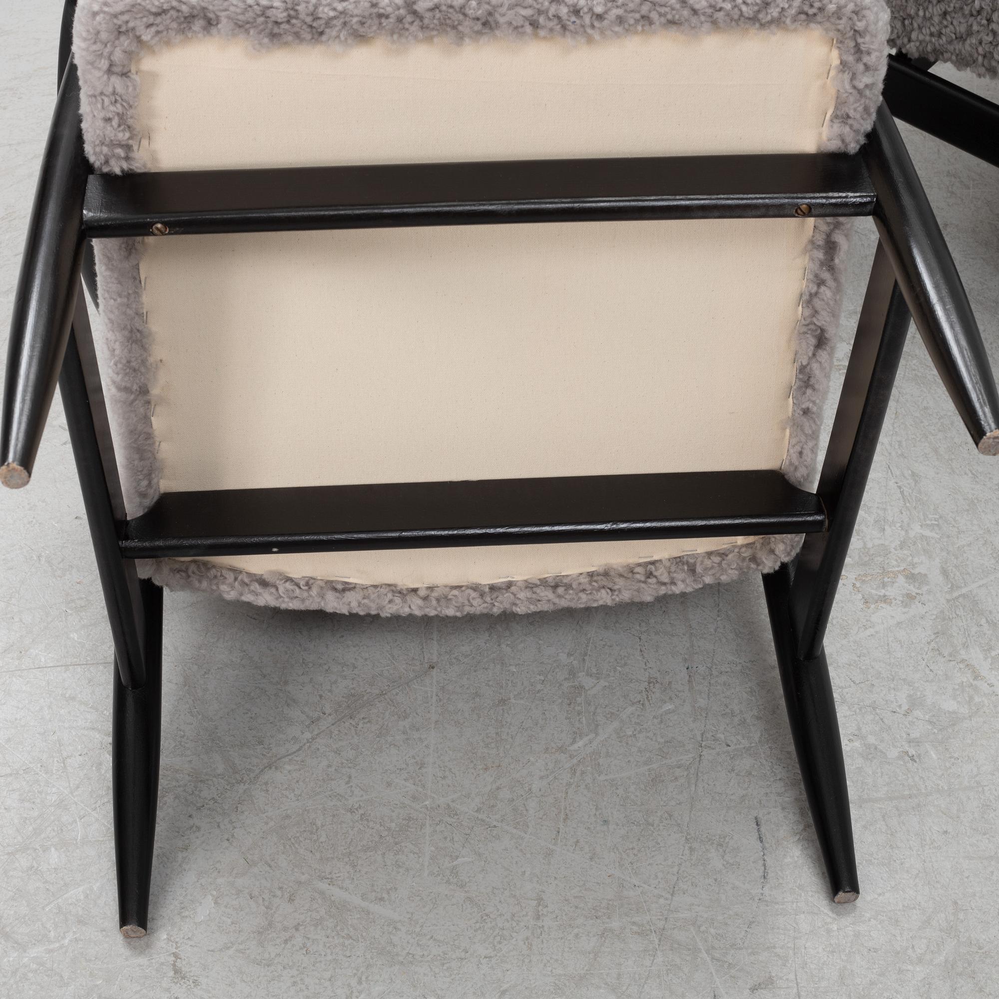 A pair of easy chairs, 1950's/60's.