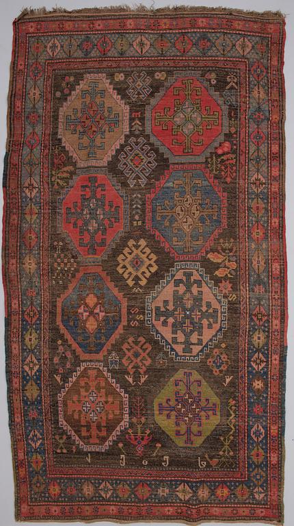 A ANTIQUE KARABAGH CARPET, 247x135 cm.