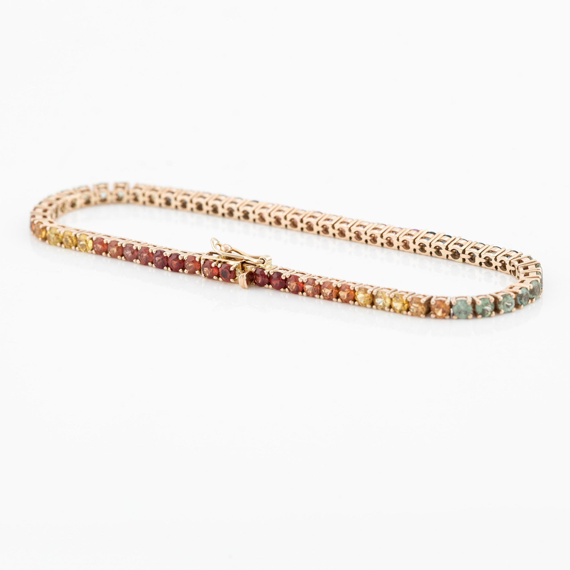 Bracelet 18K gold with multicoloured sapphires.