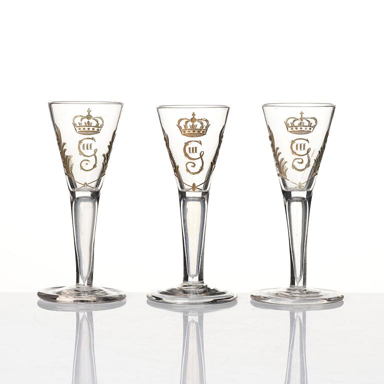 A set of six glasses and a bottle, Sweden, 18th century with King Gustavus IIIs monogram.