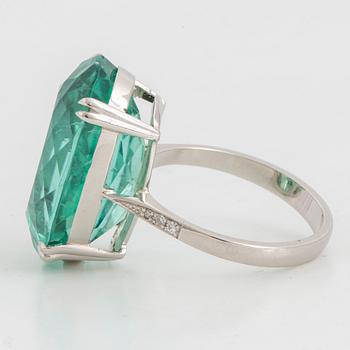 Large greenblue oval faceted tourmaline  cocktail ring.
