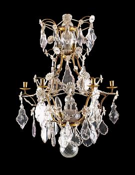 1013. A Rococo six-light chandelier.