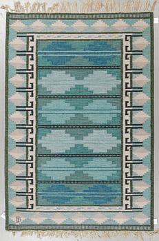 A carpet, flat weave, ca 203,5 x 138,5 cm, indistinct signature.