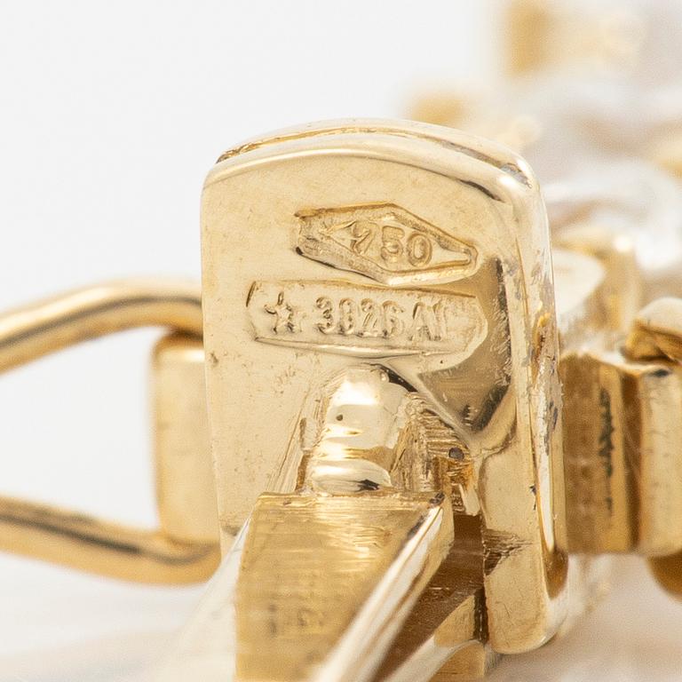 Tennis bracelet in 18K gold with brilliant-cut diamonds.