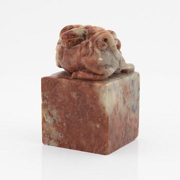 A celadon dish, for the south east asian market, double fish, Mingstyle, 20th Century. And a Chinese sealstone.