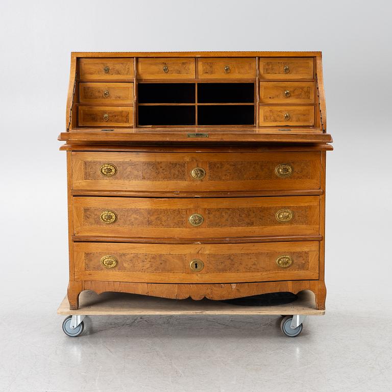 A slant-front chest of drawers, late Baroque style, 19th century.