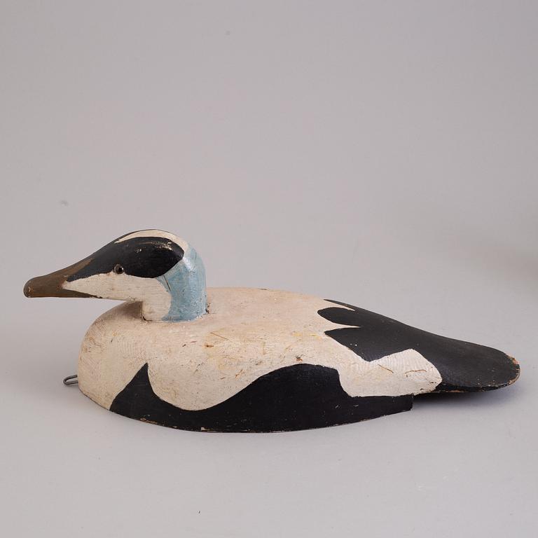 4 painted wooden ducks from the 20th century.