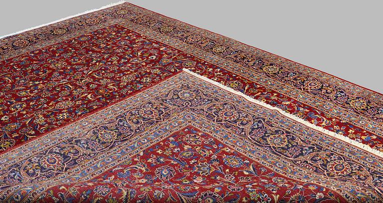 A CARPET, Kashan, signed, around 395x 295 cm.