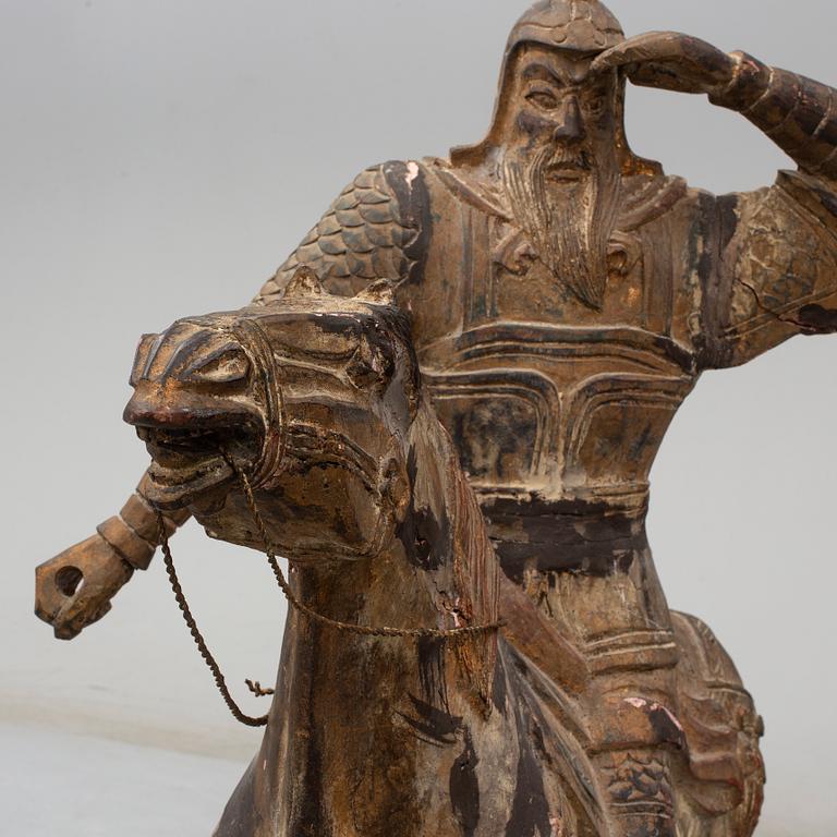 A large modern Chinese wooden sculpture.