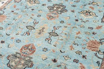 An Agra carpet, c. 302 x 239 cm.